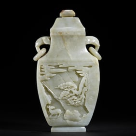 A CHINESE CARVED WHITE JADE VASE