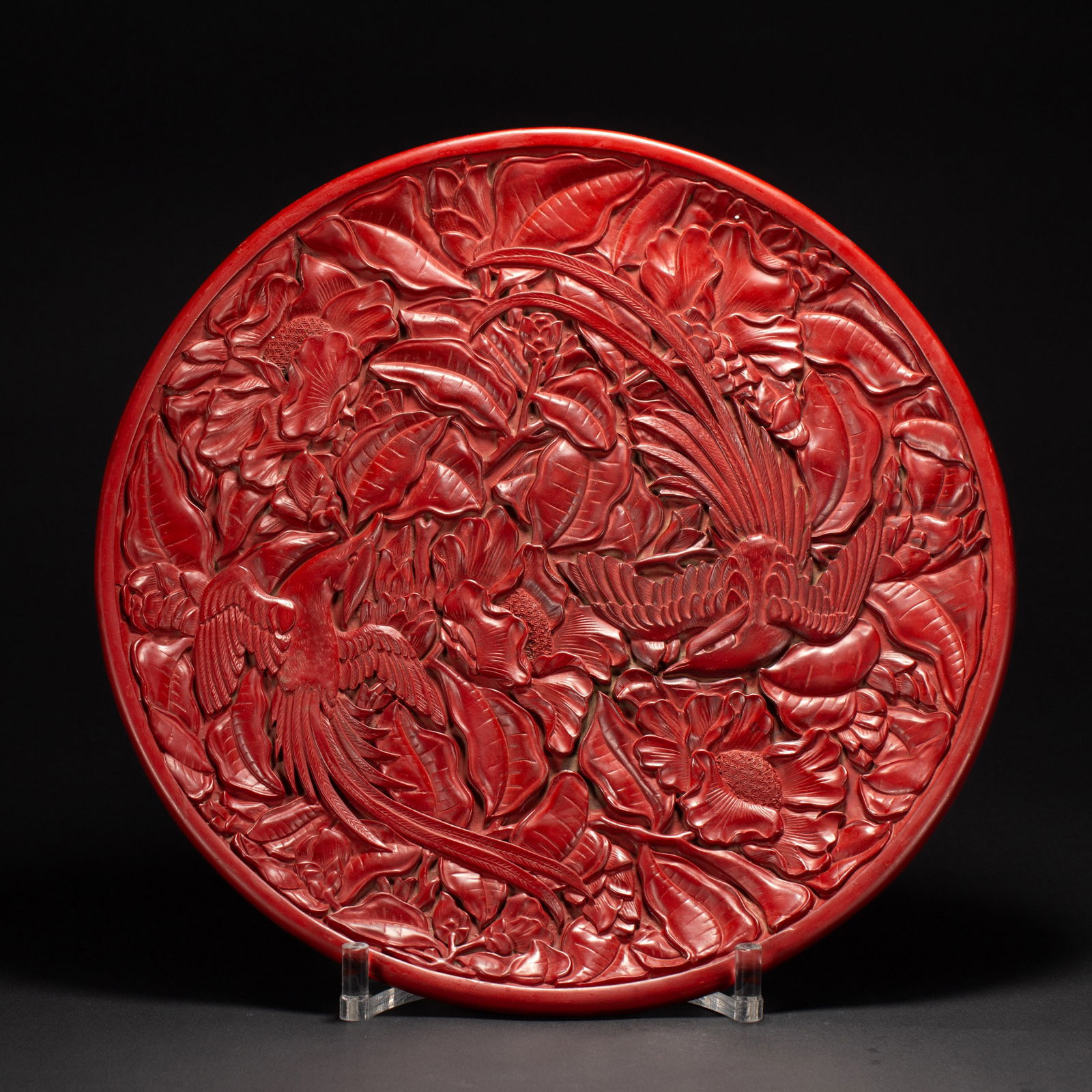 A CARVED CINNABAR LACQUER PHOENIX PLATE (1 of 10)