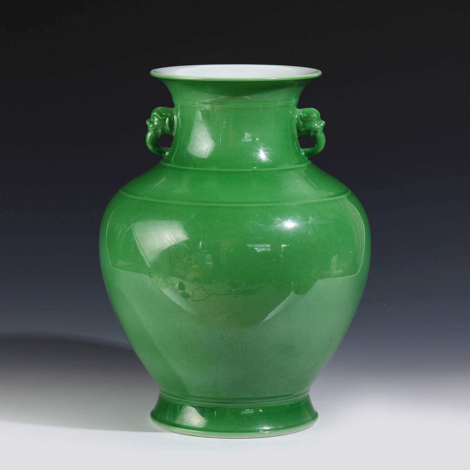FAMILLE VERTE MONOCHROME AMPHORA VASE: Dimensions: in (cm) Height: 33. 5 Diameter: 25 Chinese Qing Dynasty Period Famille Verte Monochrome Porcelain Amphora Vase. The Porcelain potted in a amphora shaped vase, large, thick and tall, globul