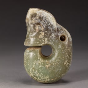 A CARVED JADE PIG-DRAGON