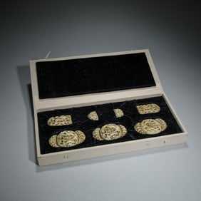 A RARE SET OF CARVED JADE BELT PLAQUES