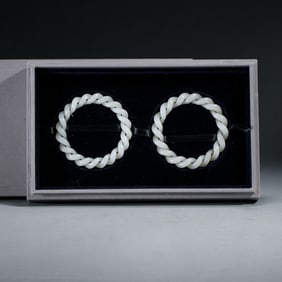 PAIR CARVED WHITE JADE BANGLES
