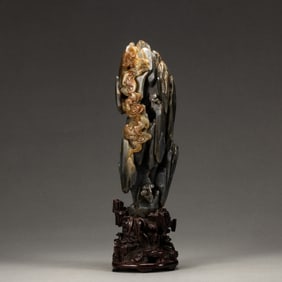 A JADE CARVING OF LITERATI ROCK