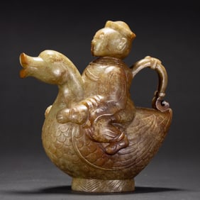 A CARVED JADE DUCK AND FIGURE