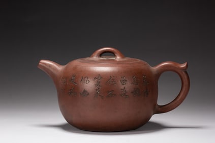 A YIXING GLAZE ZISHA TEAPOT