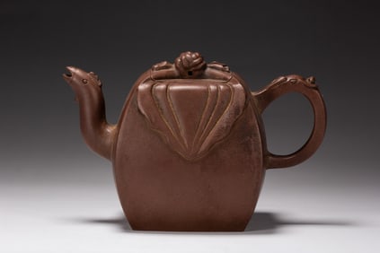 A YIXING GLAZE ZISHA TEAPOT