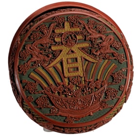 A CARVED LACQUER BOX WITH COVER