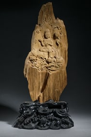 A CARVED CHENXIANG SEATED GUANYIN