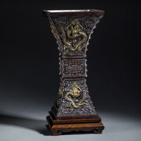 A CARVED ALOES WOOD BEAKER VASE GU