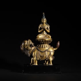 A SINO-TIBETAN BRONZE-GILT FIGURE OF MANJUSRI