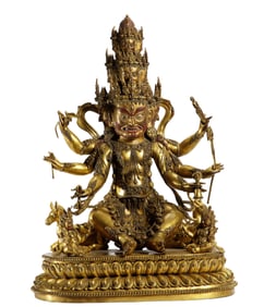 A GILT BRONZE TIBETAN FIGURE OF BUDDHA SEATED STATUE