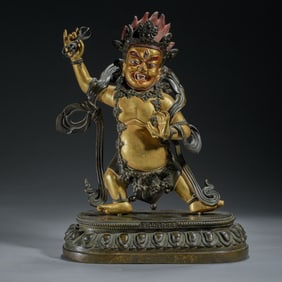 A SINO-TIBETAN BRONZE GILT BEGTSE CHEN