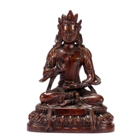 A CHINESE CARVED ALOES WOOD SEATED BUDDHA
