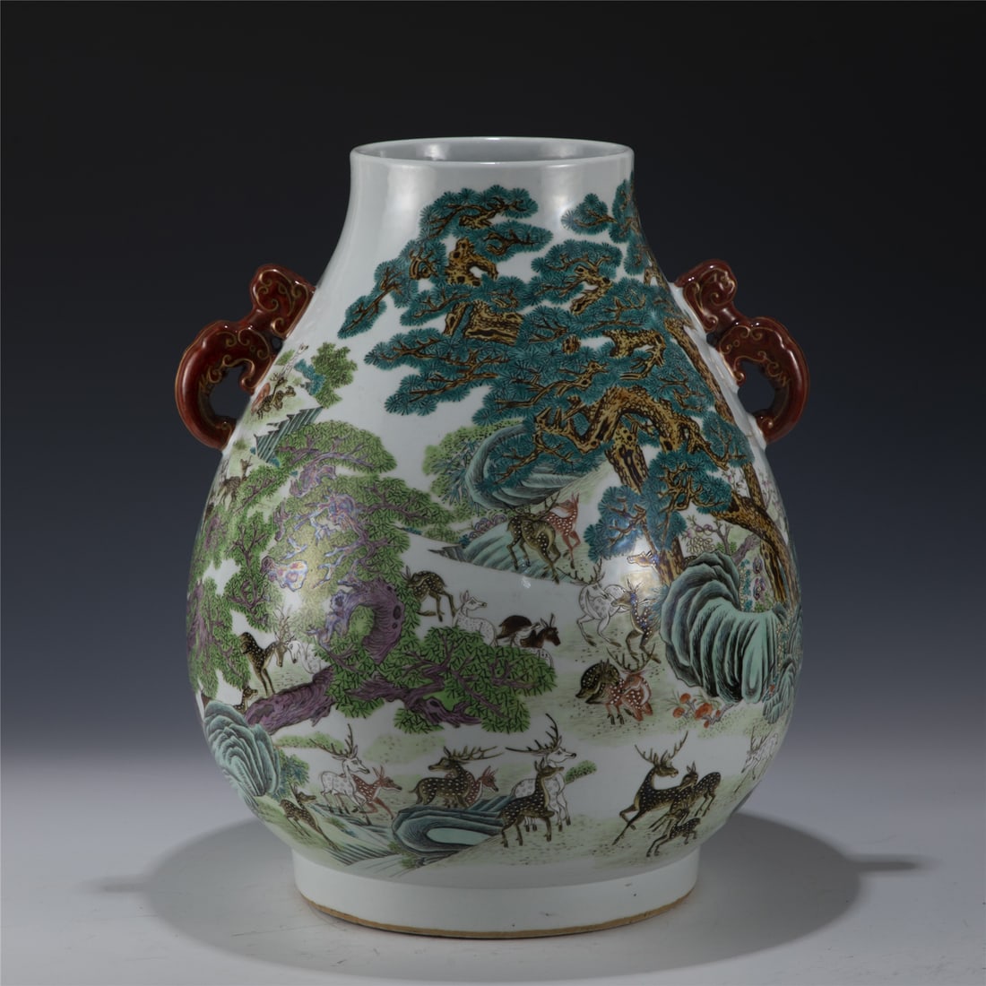 QIANLONG HUNDRED DEER ZUN VASE: Measurements: Length: 37.2cm, Width: 37.2cm, Height: 44.8cm Chinese Qing Dynasty QianLong Wucai Hundred Deer Porcelain Zun Vase. Potted in a Zun shaped vase, thick and large, globular body, slighty
