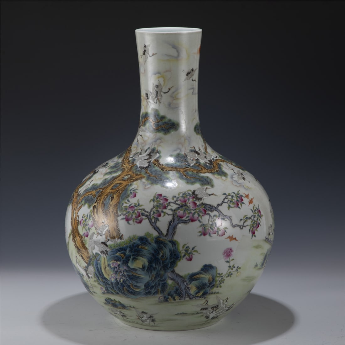 QIANLONG FAMILLE ROSE LANDSCAPE CELESTIAL VASE: Measurements: Length: 38cm, Width: 38cm, Height: 51.8cm Chinese Qing Dynasty Qianlong Famille Rose Landscape Porcelain Celestial Vase. Potted in celestial shape vase, thick and tall, globular lower