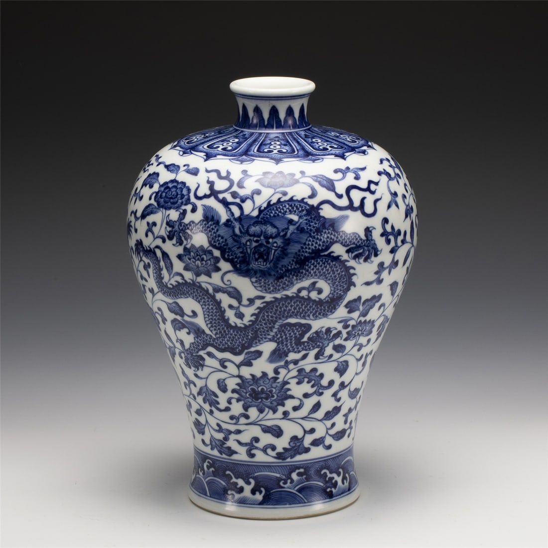 QING QIANLONG BLUE & WHITE PLUM JAR: Measurements: Length: 20.8 cm, Height: 30.3 cm Chinese Qing Qianlong Blue and White Dragon Porcelain Plum Bottle Vase. Potted into a traditional Meiping form, large, thick and tall potted, wide