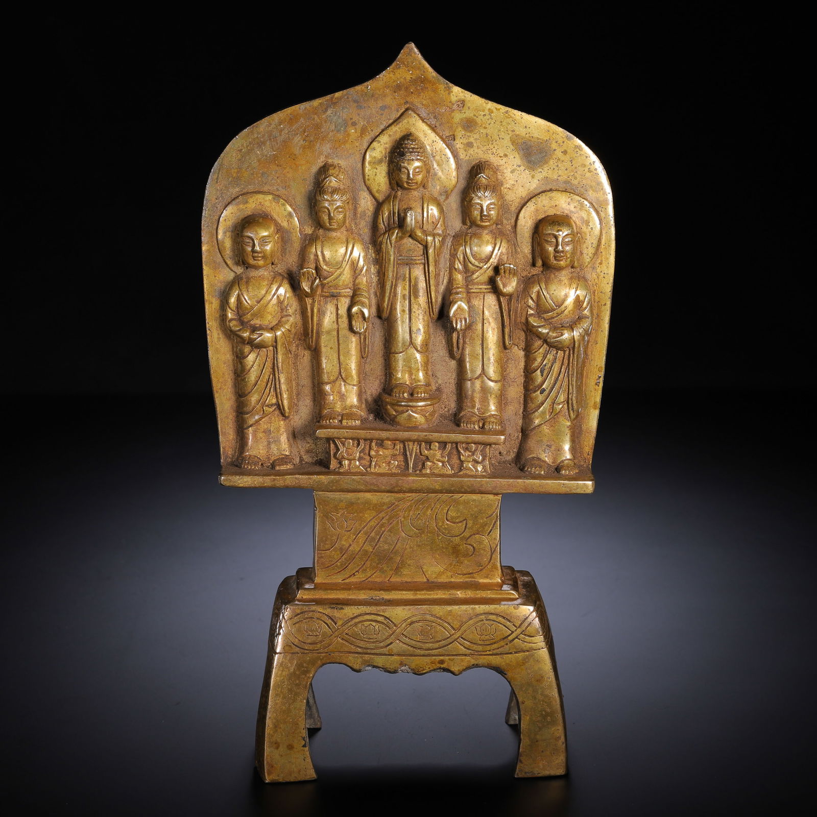 CHINESE GILT BRONZE BUDDHA STELE: Dimensions: H. 24 cm. Weight 1680 grams. This striking Chinese gilt bronze Buddha stele stands 24 cm high and weighs 1680 grams, featuring a central Buddha figure flanked by attendants and