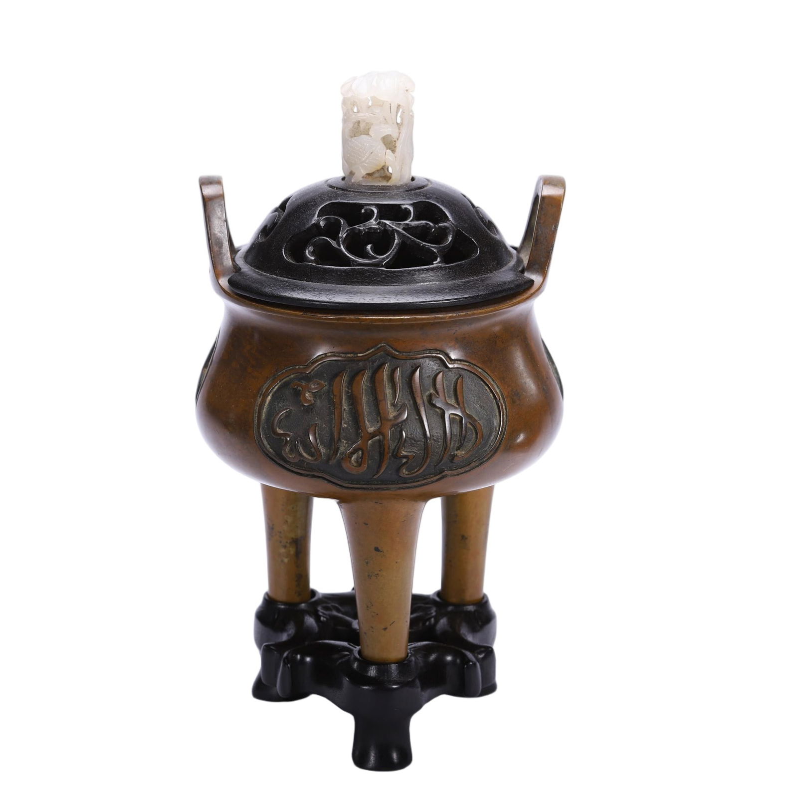 CHINESE BRONZE ARABIC SCRIPT CENSER: Dimensions: L. 12 cm. W. 12 cm. H. 23 cm. Weight 1570 grams. This elegant Chinese bronze tripod censer features upright loop handles, a pierced hardwood lid topped with a white jade dragon finial, and