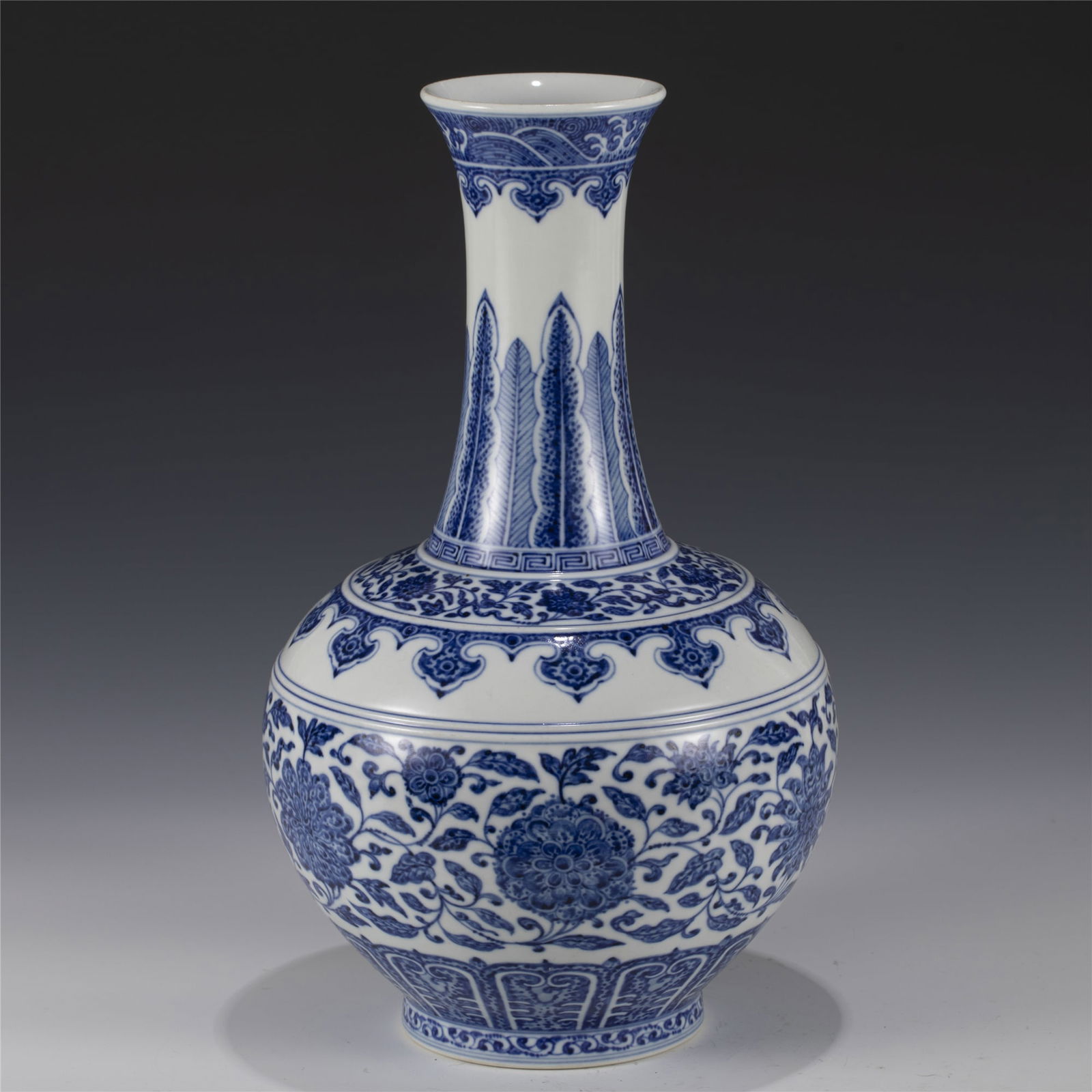 QING BLUE & WHITE VASE: Measurements: Length: 22.2 cm, Width: 22.2 cm, Height: 36.5 cm Chinese Qing Dynasty Qianlong Blue and White Lotus Reward Vase . Potted in reward shape vase, thick and tall, globular lower body, cylind