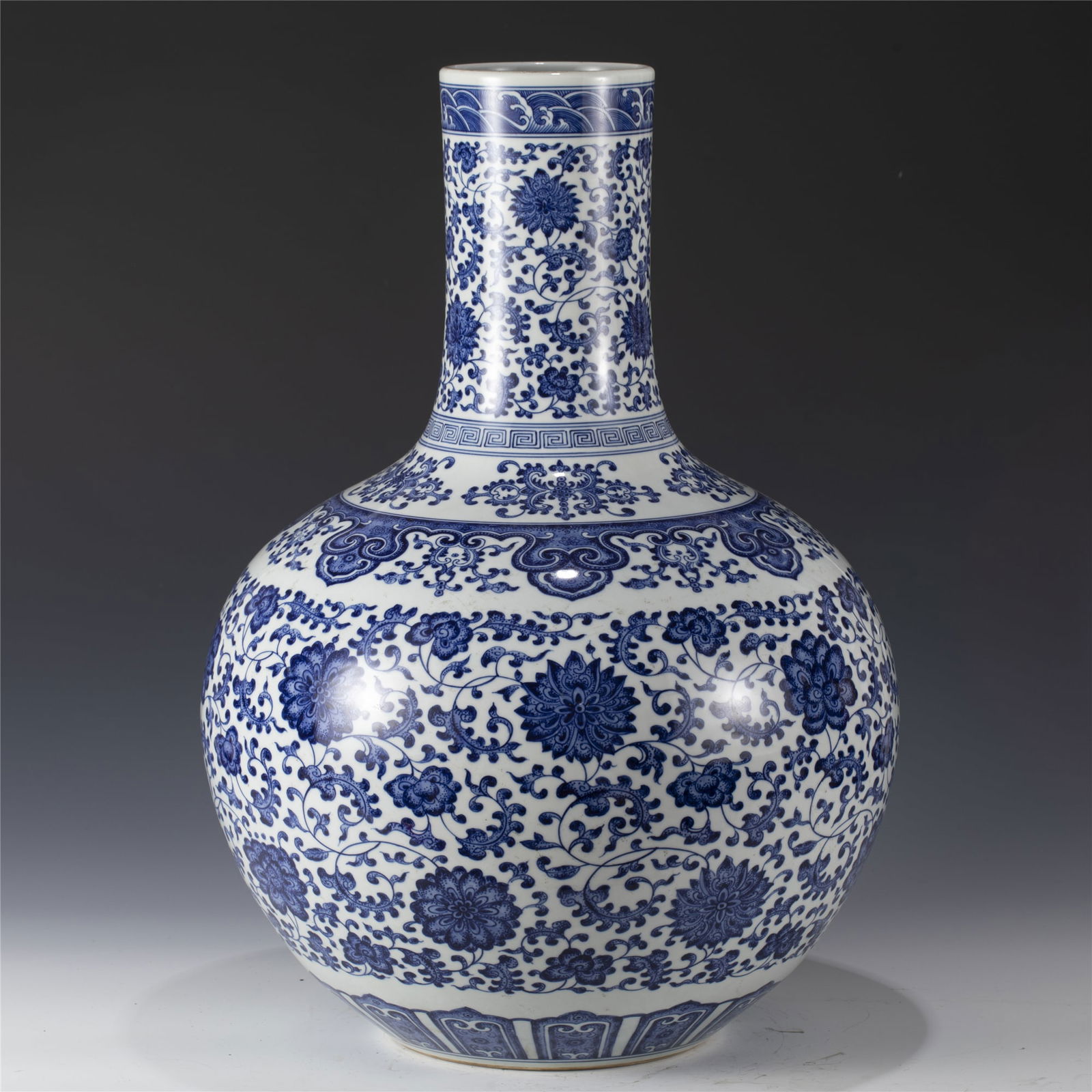 QING BLUE & WHITE CELESTIAL VASE: Measurements: Length: 38.8 cm, Width: 38.8 cm, Height: 53 cm Chinese Qing Dynasty Qianlong Blue and White Lotus Porcelain Celestial Sphere Vase. Potted in celestial shape vase, thick and tall, globula