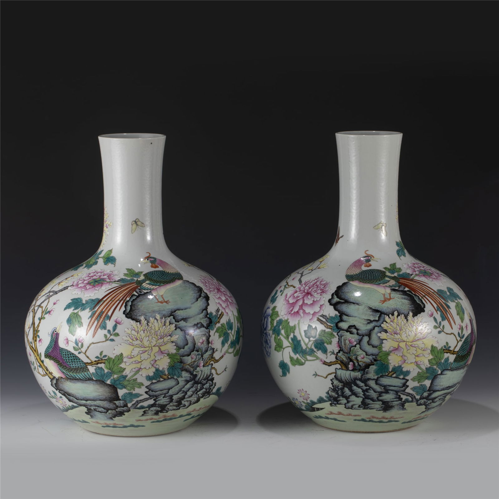PAIR OF QING FAMILLE ROSE CELESTIAL SPHERE VASES (1 of 10)