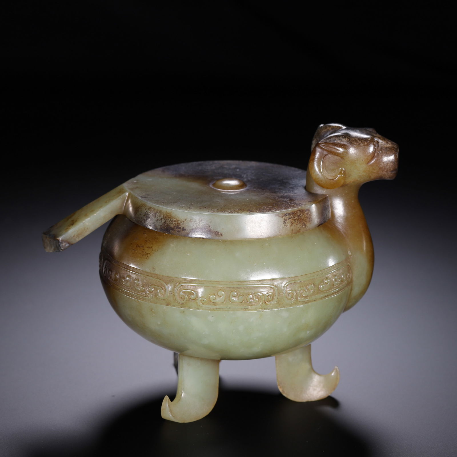 CHINESE HETIAN JADE BEAST CENSER BOX: Dimensions: L. 13.5 cm. W. 10 cm. H. 10.5 cm. Weight 410 grams. This distinctive Chinese Hetian jade censer box features a mythical beast-headed spout, a flat lid with a circular knob, and three curve