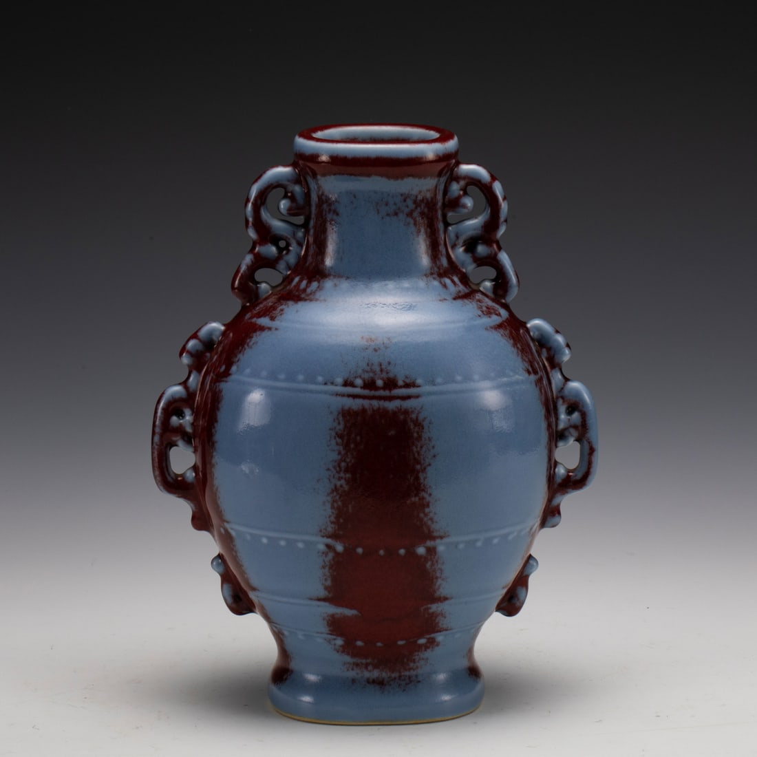 LUJUN GLAZED BOTTLE VASE: Measurements: Length: 18.3 cm, Width: 11.3 cm, Height: 24 cm Chinese Qianlong Lujun Glazed Porcelain Bottle Vase. Potted in amphora shape vase, globular heavy on mid body, flaring round mouth rim,