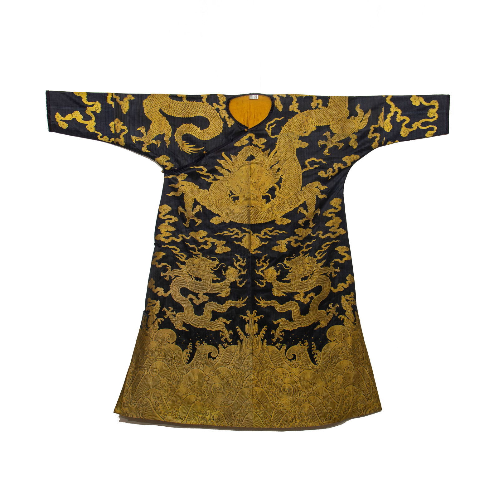 CHINESE YUNJIN BROCADE DRAGON ROBE: Dimensions: L. 183 cm. H. 148 cm. This magnificent Chinese Yunjin (Nanjing brocade) dragon robe features a deep indigo silk ground elaborately woven with gilt-thread five-clawed dragons amidst scrolli