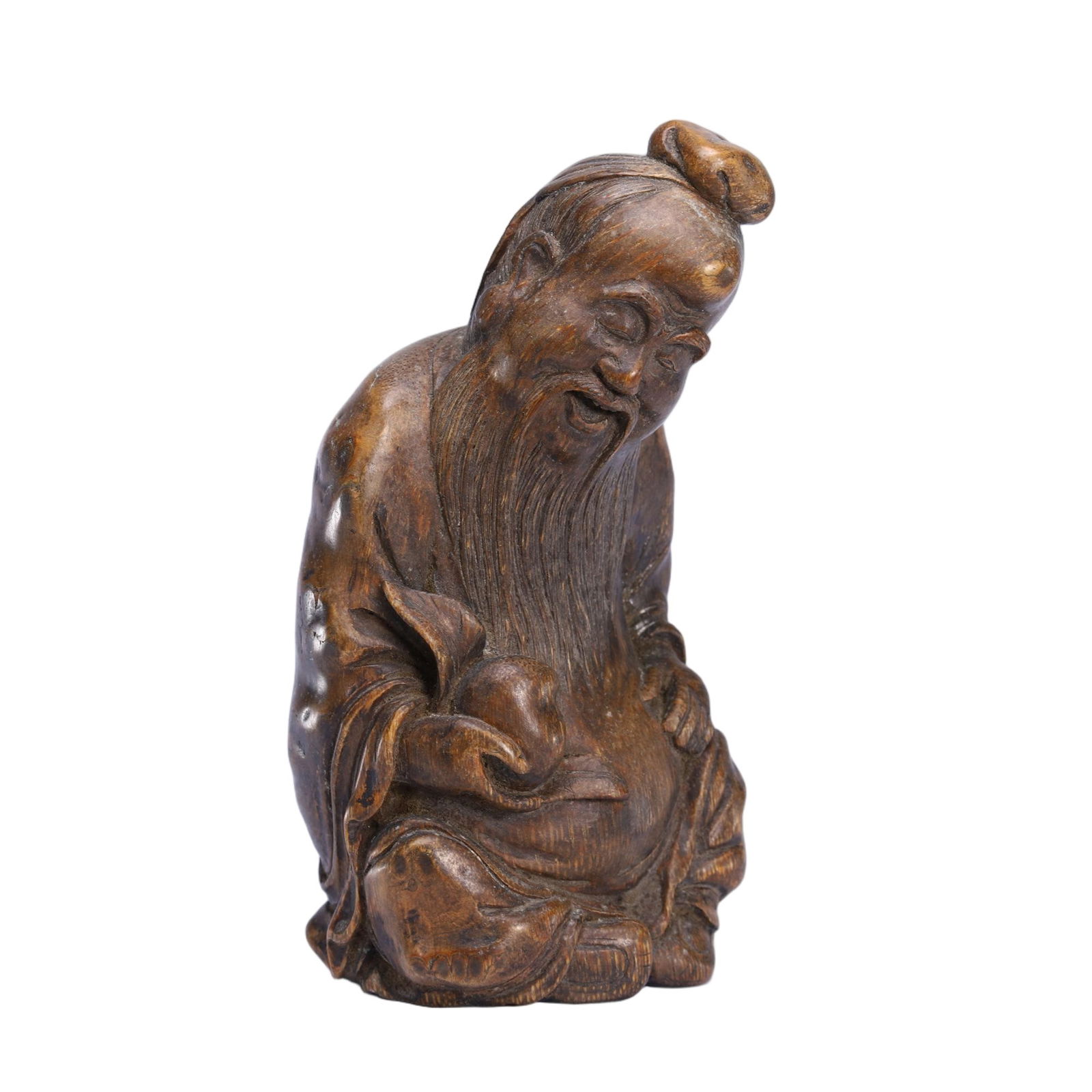 CHINESE BAMBOO CARVED FIGURE ORNAMENT: Dimensions: L. 8.5 cm. W. 8.5 cm. H. 15.5 cm. Weight 230 grams. This expressive Chinese bamboo carved figure depicts a seated elder with a long flowing beard and a serene facial expression,