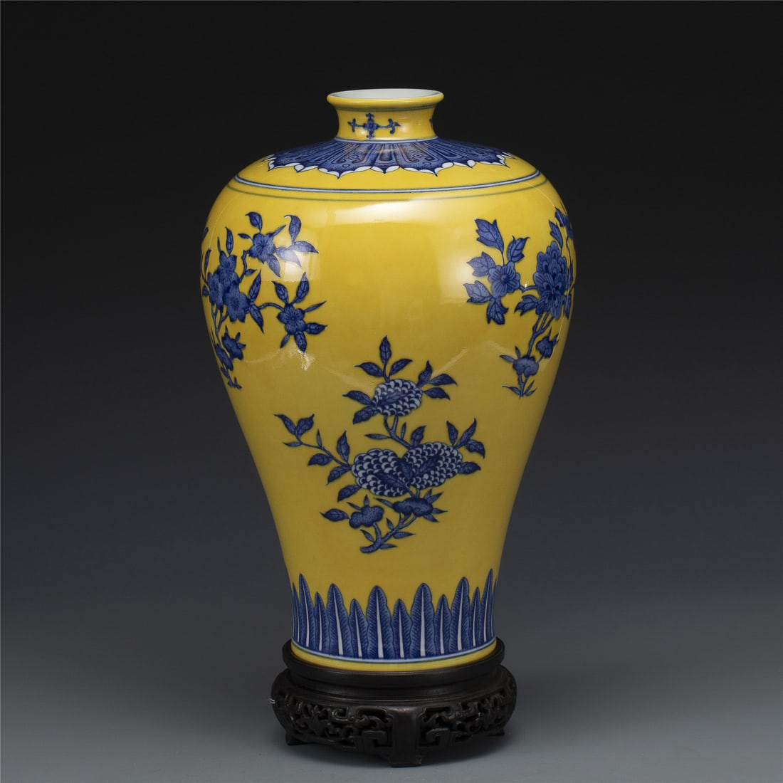 QING QIANLONG BLUE & WHITE YELLOW GLAZE VASE: Measurements: Width: 22.8 cm, Height: 34.7 cm Chinese Qing Dynasty Qianlong Blue and White Yellow Glaze Porcelain Plum Vase On Carved Hardwood Stand. Potted into a traditional Meiping form, large,