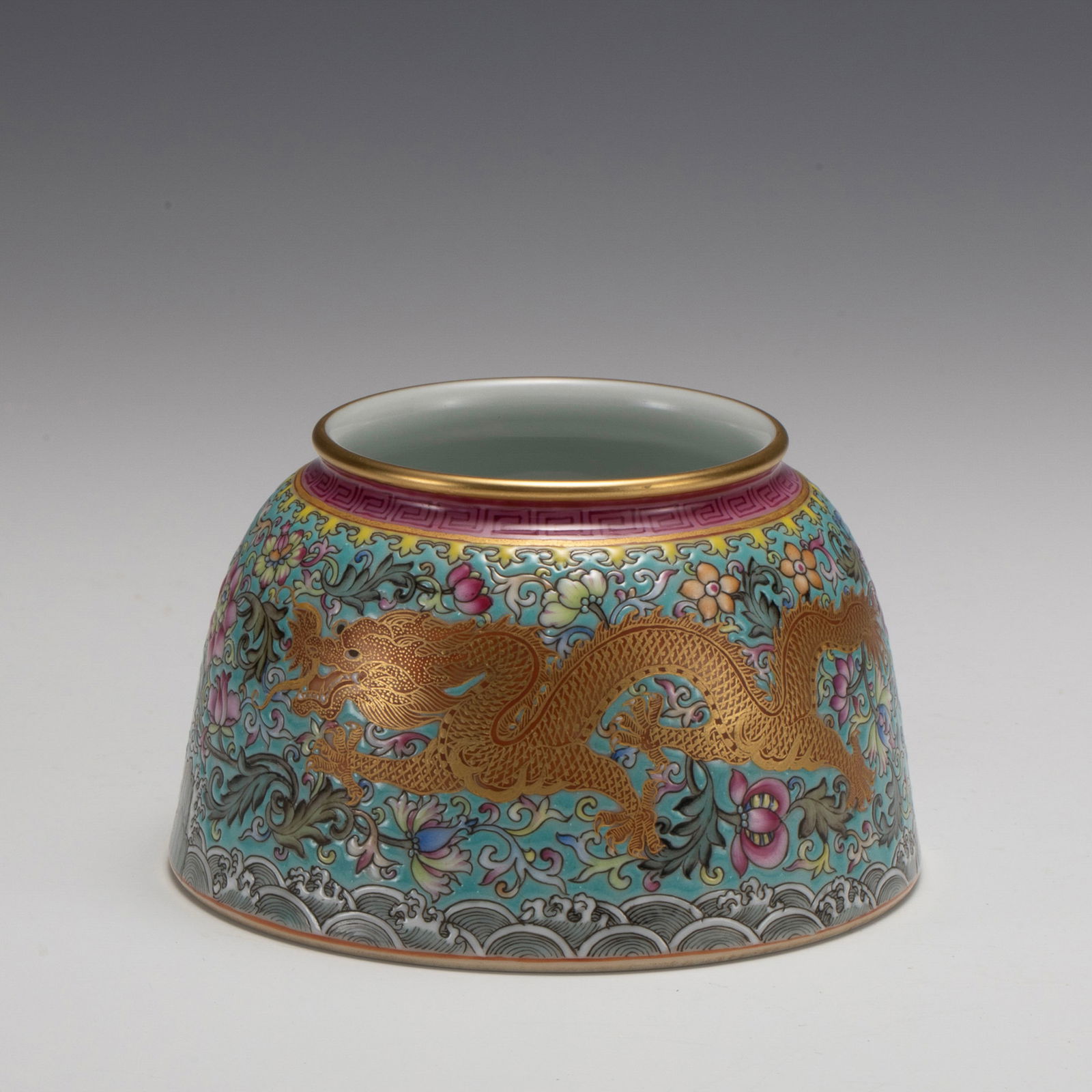 QING YONGZHENG FAMILLE ROSE WATER POT: Dimensions: Width: 10.2 cm x Heigth: 6 cm Chinese Qing Dynasty YongZheng Famille Rose Porcelain WaterPot. The porcelain p erial five claws dragon flying careening through cumulus clouds above