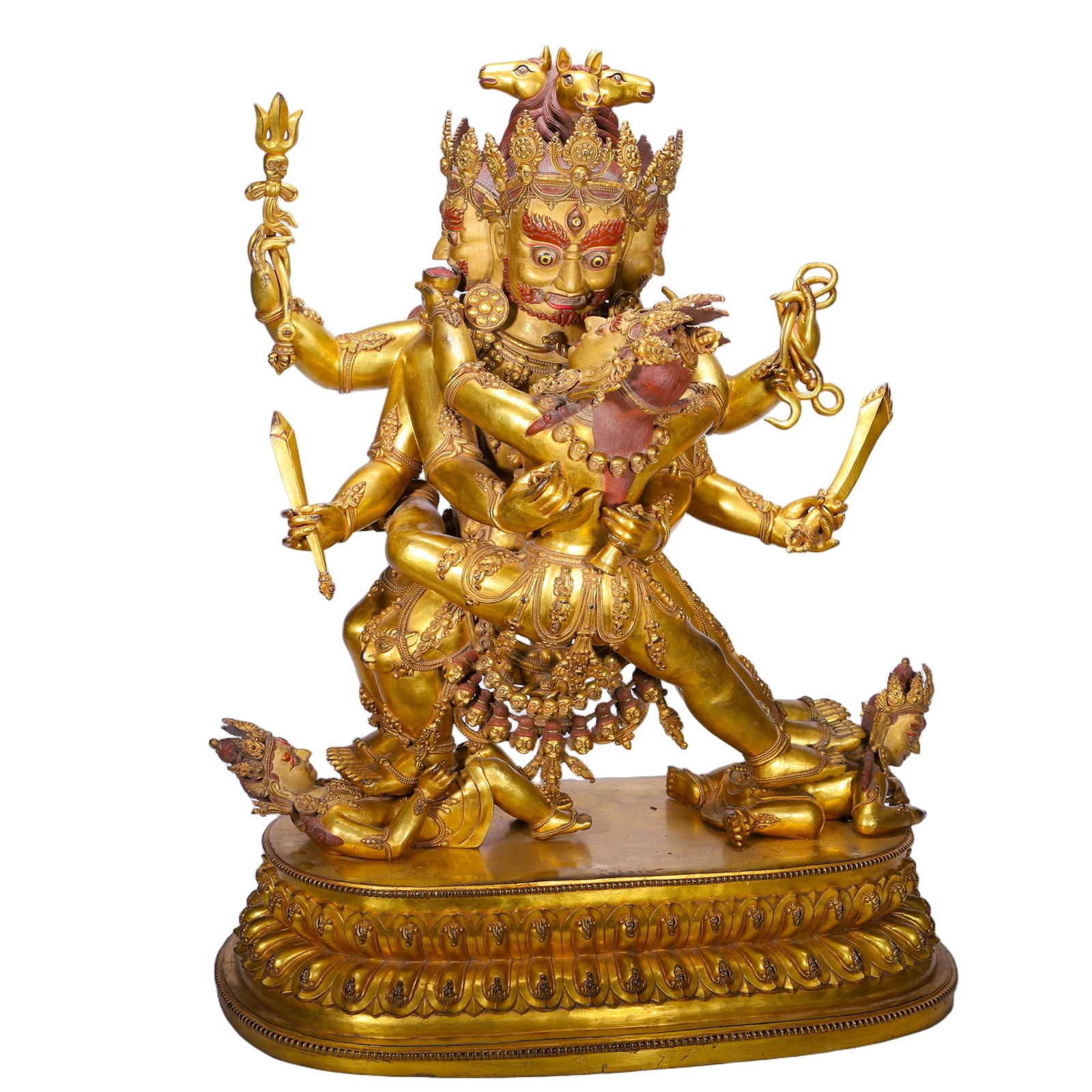 CHINESE GILT BRONZE HAYAGRIVA STATUE: Dimensions: L. 55 cm. W. 30 cm. H. 70 grams. This dynamic Chinese gilt bronze statue depicts Hayagriva (Horse-Headed Vajra) in yab-yum embrace, with multiple arms holding ritual implements including a