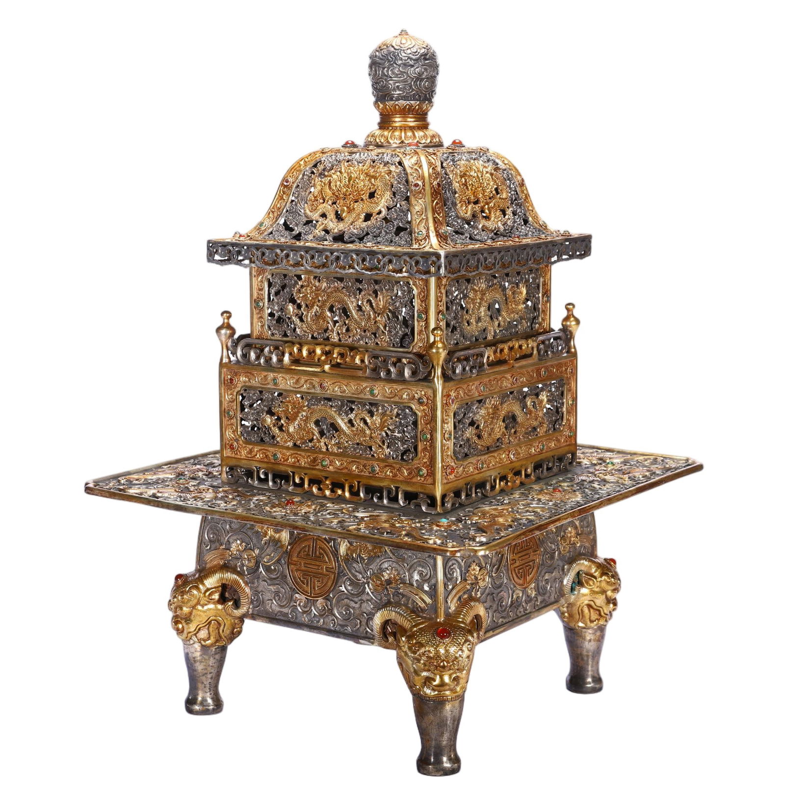 CHINESE GILT BRONZE RAM HEAD CENSER: Dimensions: L. 32 cm. W. 32 cm. H. 47 grams. This magnificent Chinese gilt bronze four ram head censer measures 32 cm long, 32 cm wide and 47 cm high (note: unit correction from grams to cm), featurin
