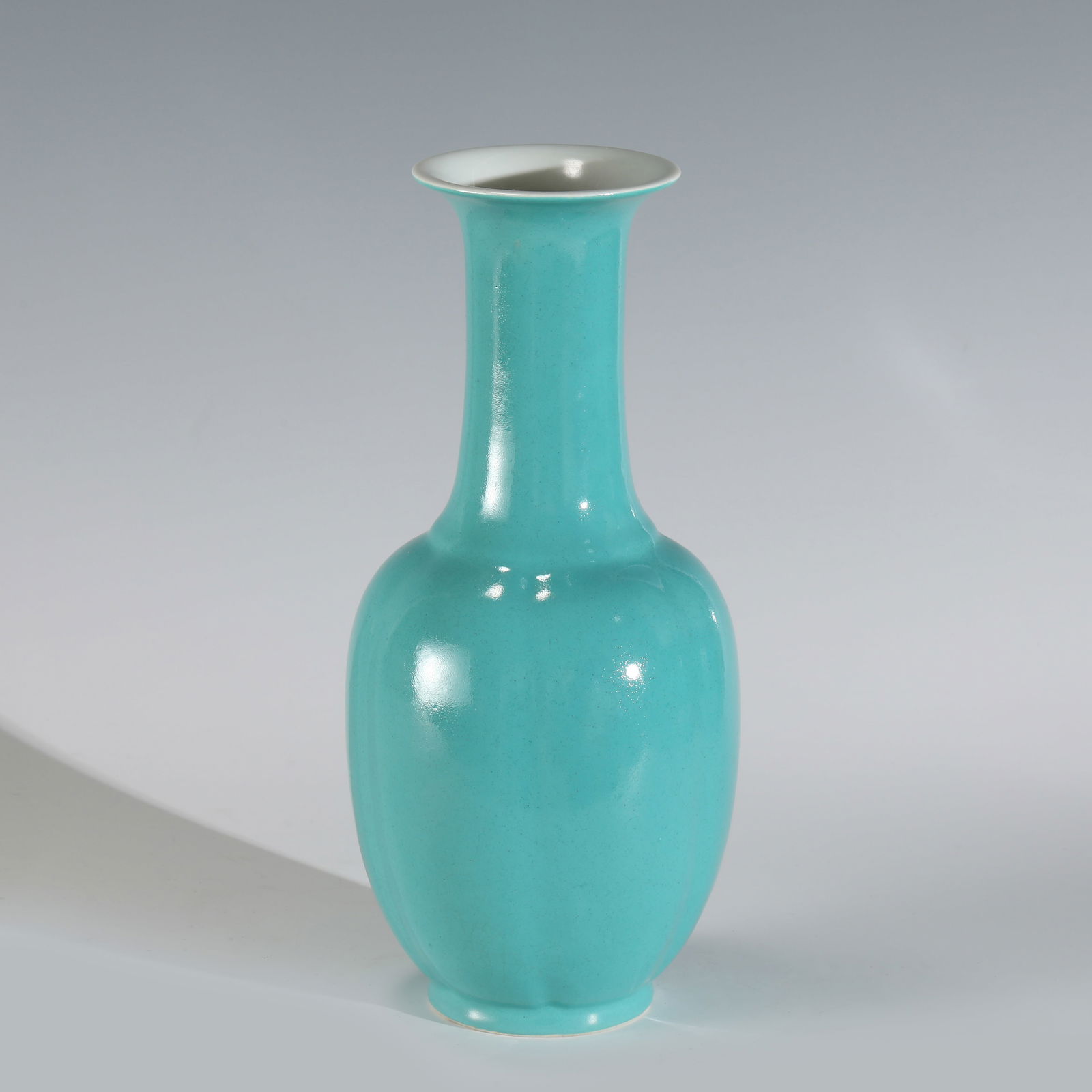 QING GUANGXU MALACHITE GREEN GLAZED BOTTLE: Measurements: Height: 26 cm, Diam: 11.8cm Chinese Qing Dynasty Guangxu Malachite Green Porcelain Bottle Vase. The porcelain potted in baluster shape vase, large, thick, drum ovoid body, tall cylindric