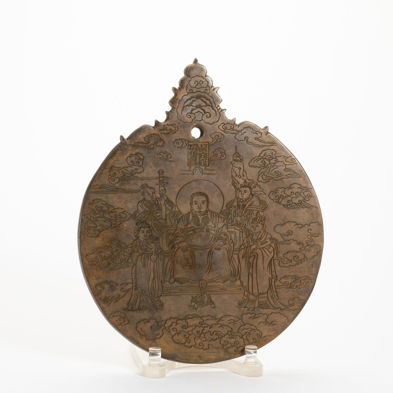 A CHINESE BRONZE ZHENWU PLAQUE: Dimensions: H. 38 cm. W. 31 cm. Weight 8115 grams. This impressive Chinese bronze plaque of Zhenwu (True Warrior Emperor) stands 38cm in height and 31cm in width, weighing 8115g. Cast from heavy-gauge