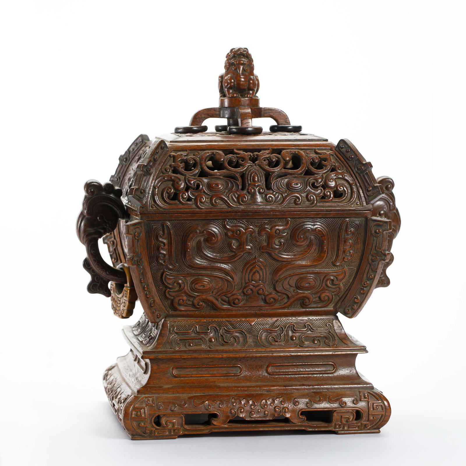 A CHINESE HUANGHUALI LIDDED BOX: Dimensions: H. 26.2 cm. W. 22.5 cm. Weight 1345 grams. This fine Chinese huanghuali wood lidded box stands 26.2cm in height, 22.5cm in width, and weighs 1345g. Crafted from rare and dense huanghuali, 