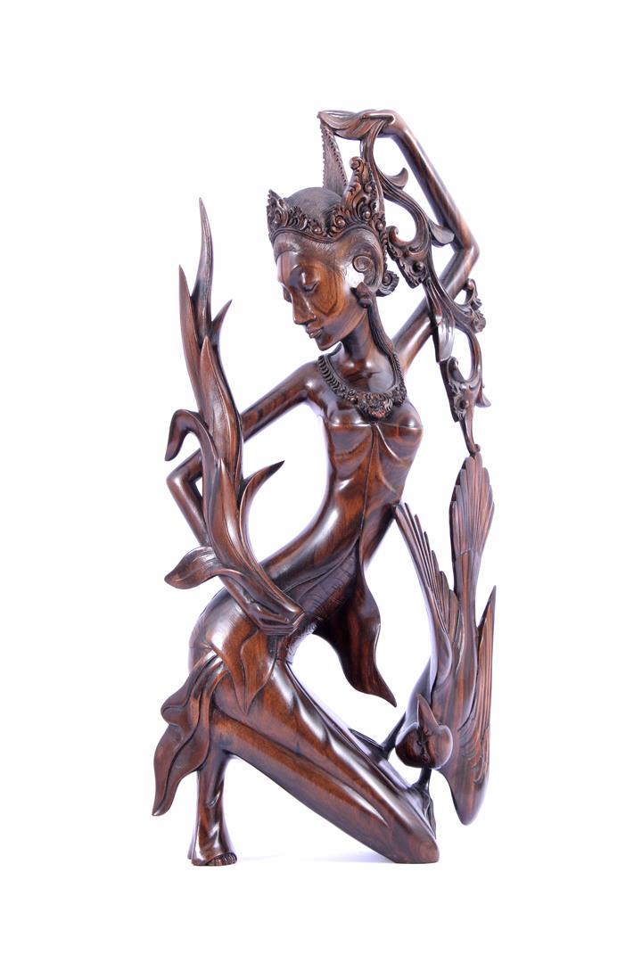 Very beautifully statue of a dancer with bird: Very beautifully stylized Balinese wooden statue of a dancer with bird, approx. 1950, 40 cm high