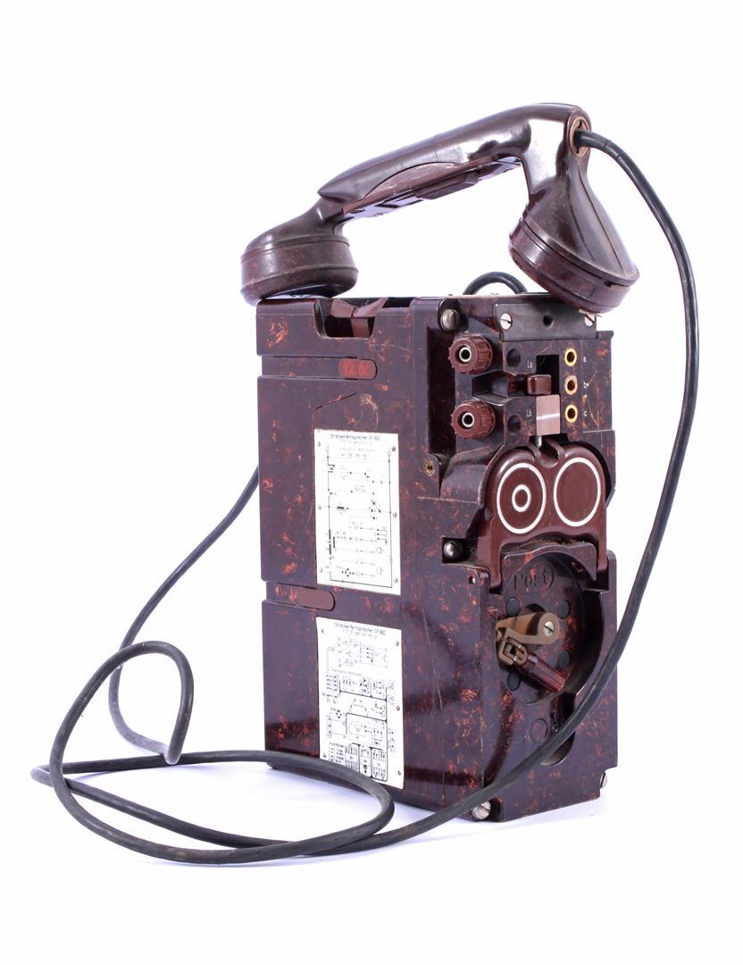 German Streckenfernsprecher field telephone: German Streckenfernsprecher SF882 & nbsp; field telephone in bakelite case, circa 1960, 23.5 x 15.5 cm