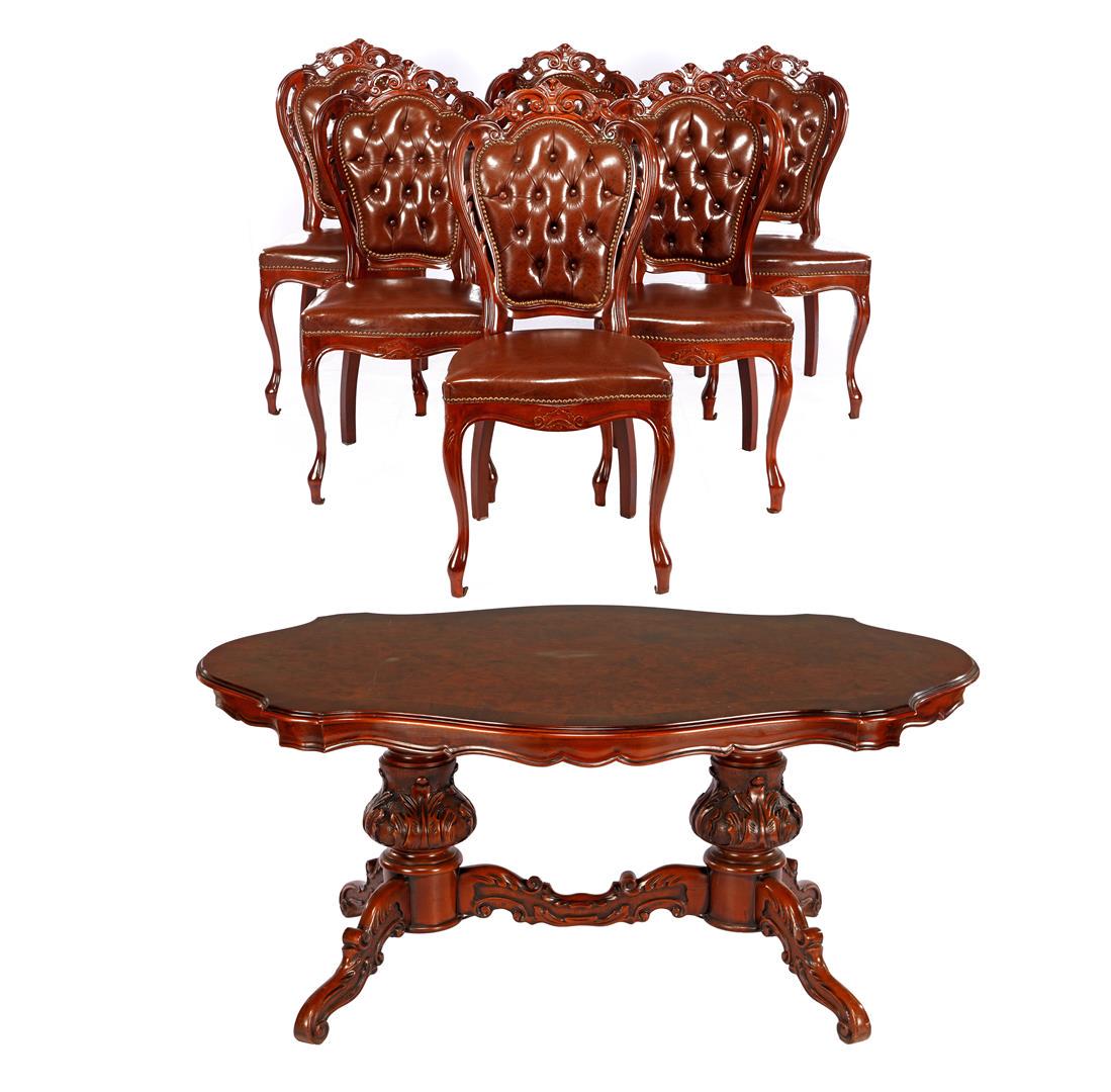 Walnut walnut dining table, consisting of oval table on: Walnut walnut dining table, consisting of oval table on double column leg, with contoured top 76.5 cm high, top 173x108.5 cm, and 6 chairs with brown leather and padded back (2 white spots in top)