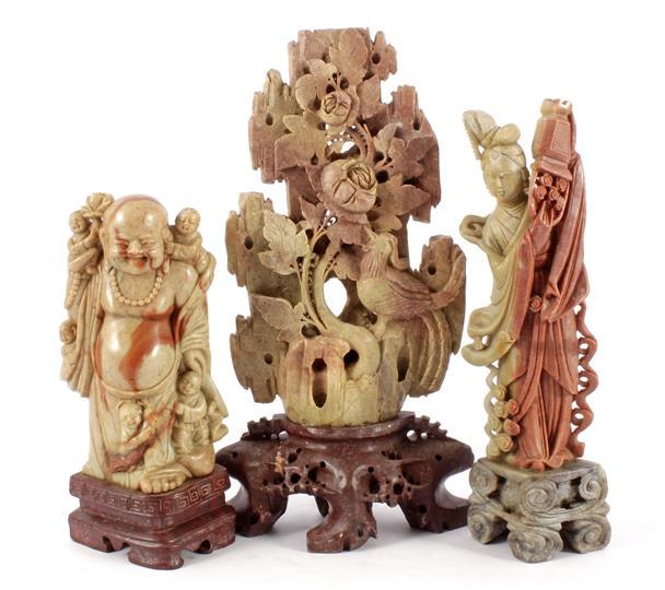3 soapstone objects: 3 soapstone decorative objects of flowers and figures, ca.1900, 24, 30 and 35 cm high