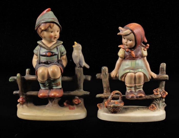 Goebel Hummel: Goebel Hummel earthenware figurine of a sitting girl on a fence 12.5 cm high and a sitting boy on a fence 14 cm high