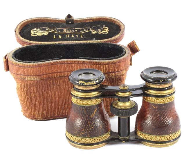 Antique classy opera glasses: Antique classy opera glasses in leather sheath, marked Grand Bazar Royal La Haye