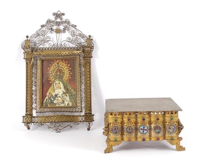Copper richly worked and lace-sawn picture frame: Copper richly worked and lace-sawn picture frame with print of Madonna 58 cm high, 34 cm wide and copper richly worked and lace-sawn religious standard with lighting under the top and front decorated 
