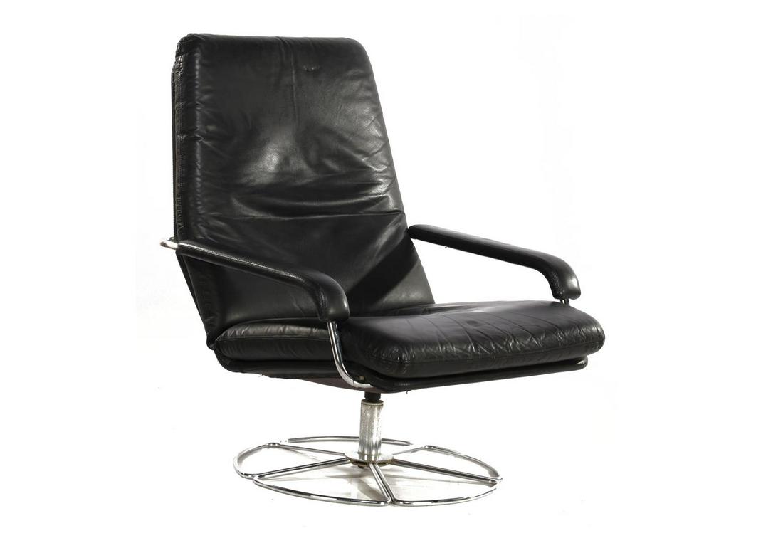 Black artificial leather swivel armchair with chromed: Black artificial leather swivel armchair with chromed base in the style of Bruno Mathsson