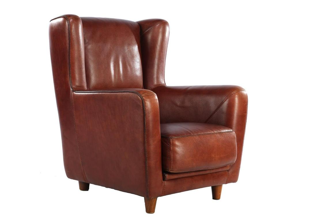 Leather wing chair: Baxter leather wing chair