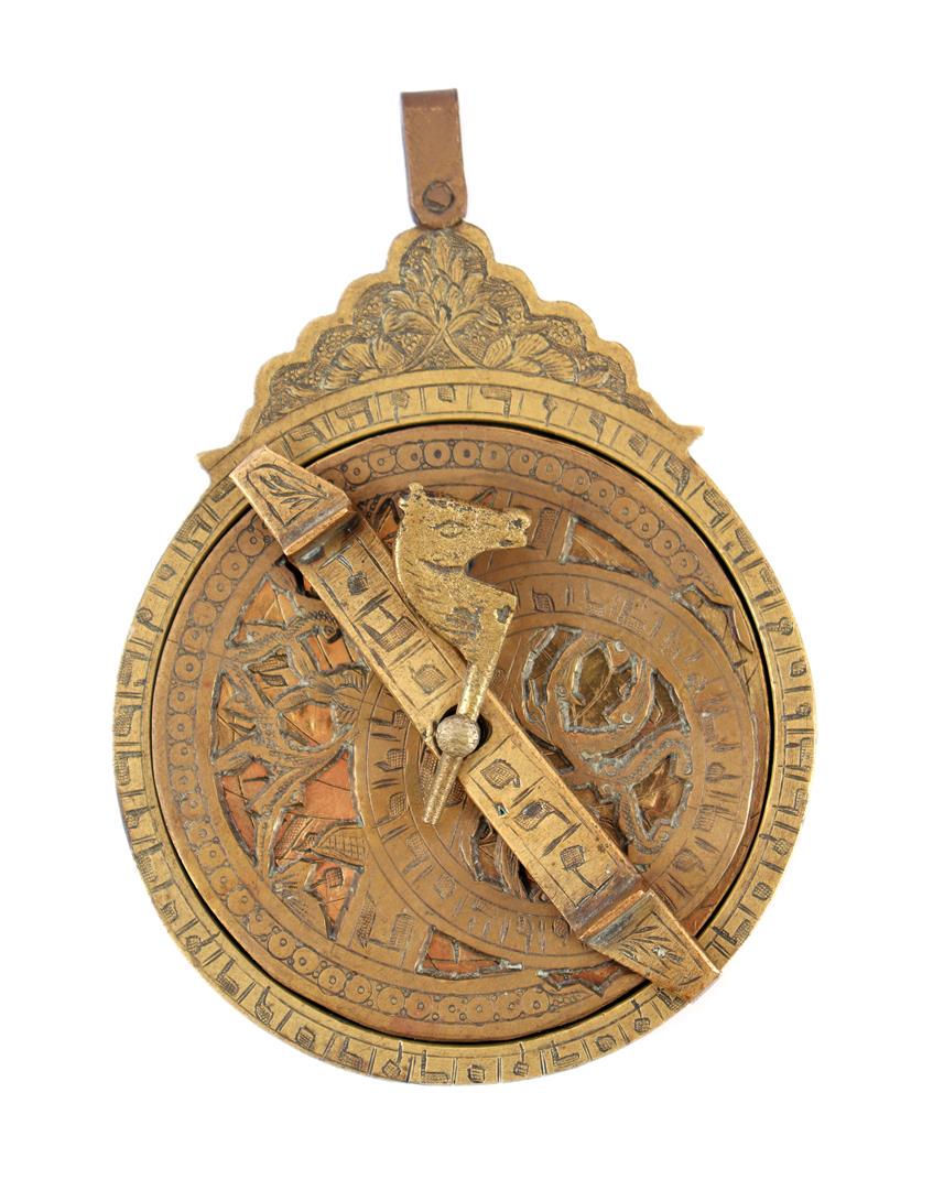 Late 19th century brass planispheric astrolabe: Late 19th century brass or bronze planispheric astrolabe with 4 loose discs and various engravings, not signed, 11.5x8 cm