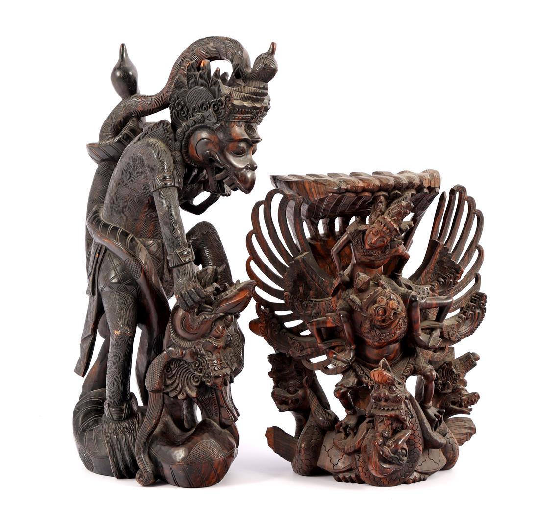 Coromandel wood bombarded statue of Garuda: Coromandel wood bombarded statue of Garuda 28.5 cm high (piece of right wing missing) and statue of Hanuman 41 cm high (small piece of wood missing)