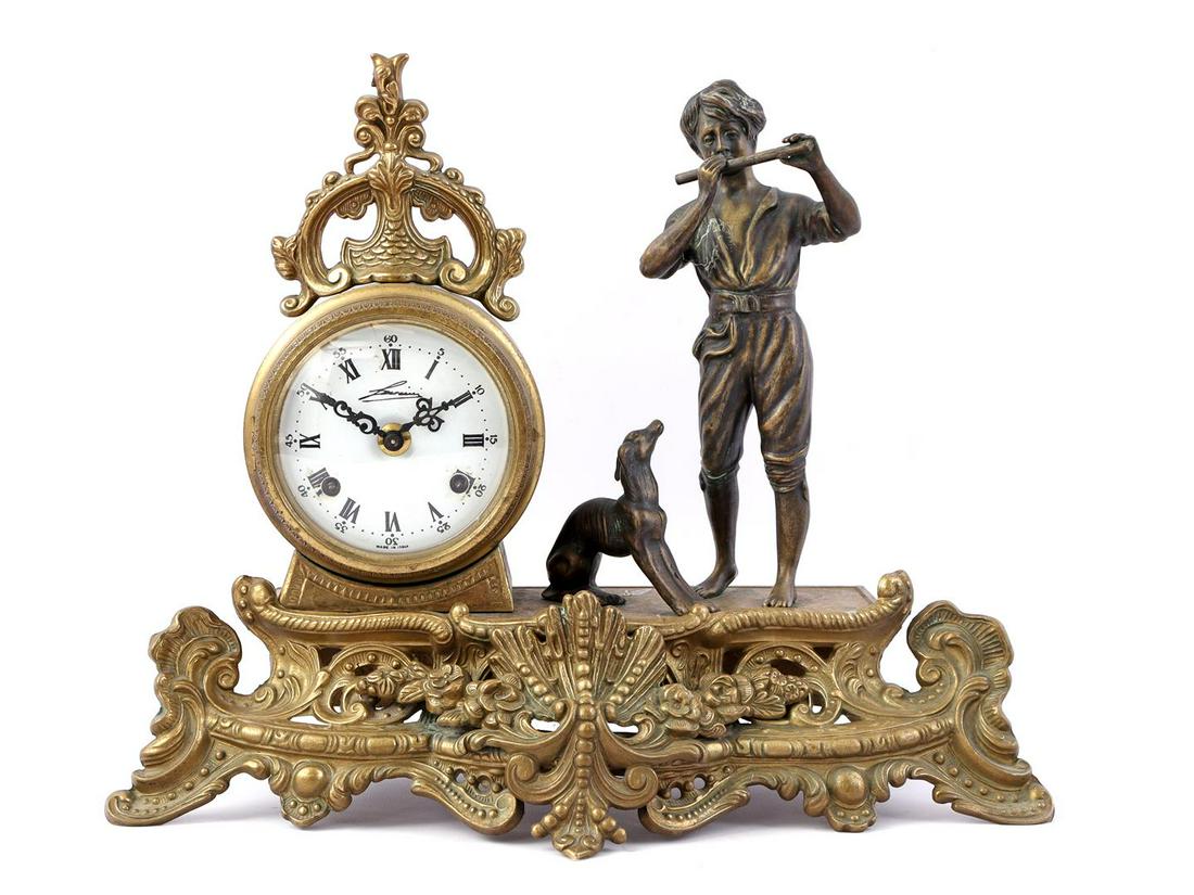 Brass mantel clock with boy and dog playing the flute (1 of 1)