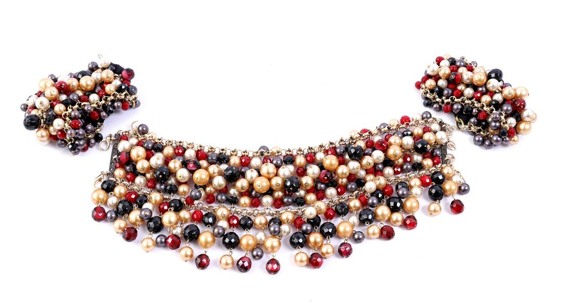 Neck jewelry with beads and 2 bracelets: Neck jewelry with beads and 2 bracelets. Accessory from celebrAGE (2011), a co-production of choreographers Adriaan Luteijn and Gisela Rocha and photographer and filmmaker Erwin Olaf. Designer: Fernan