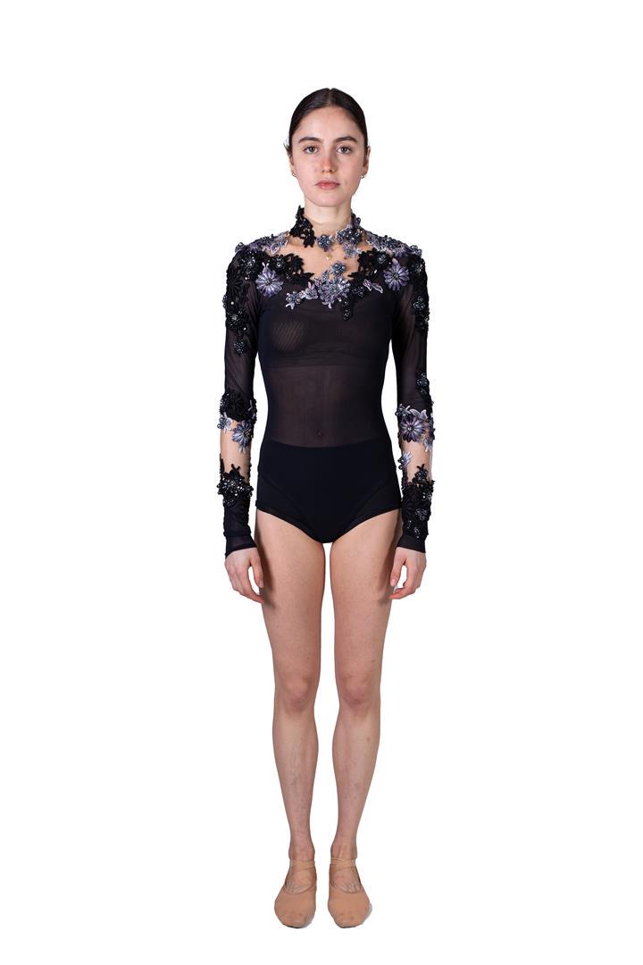 Black top with long sleeves and bead decoration.: Black top with long sleeves and bead decoration. Costume from celebrAGE (2011), a co-production of choreographers Adriaan Luteijn and Gisela Rocha and photographer and filmmaker Erwin Olaf. Costume de